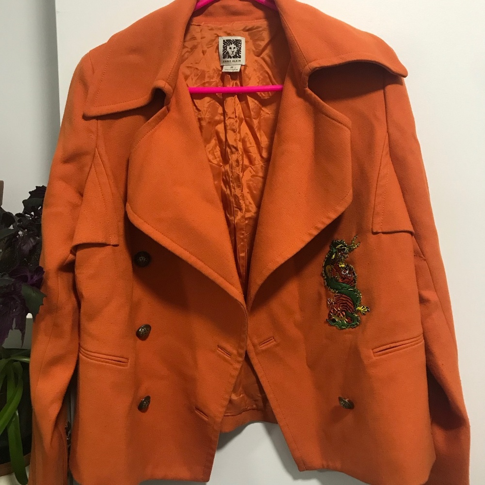Orange coat with dragon patch